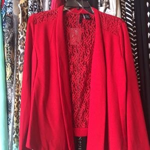 A brand new medium red cardigan